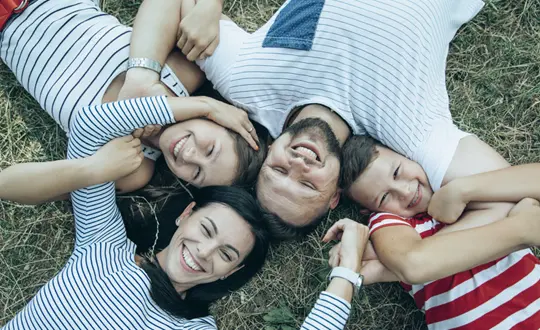 A group of people laying on the ground