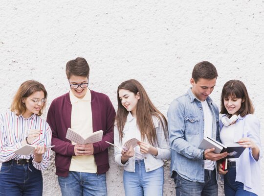 A group of people standing next to each other.